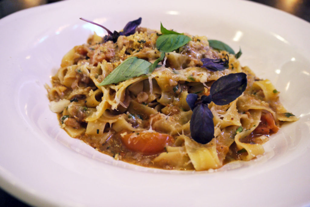 Veggie tagliatelle bolognese: Sofrito sauce, porcini, tomato & lentil ragù with garlic, pangrattato (breadcrumbs) & veggie Parmesan
