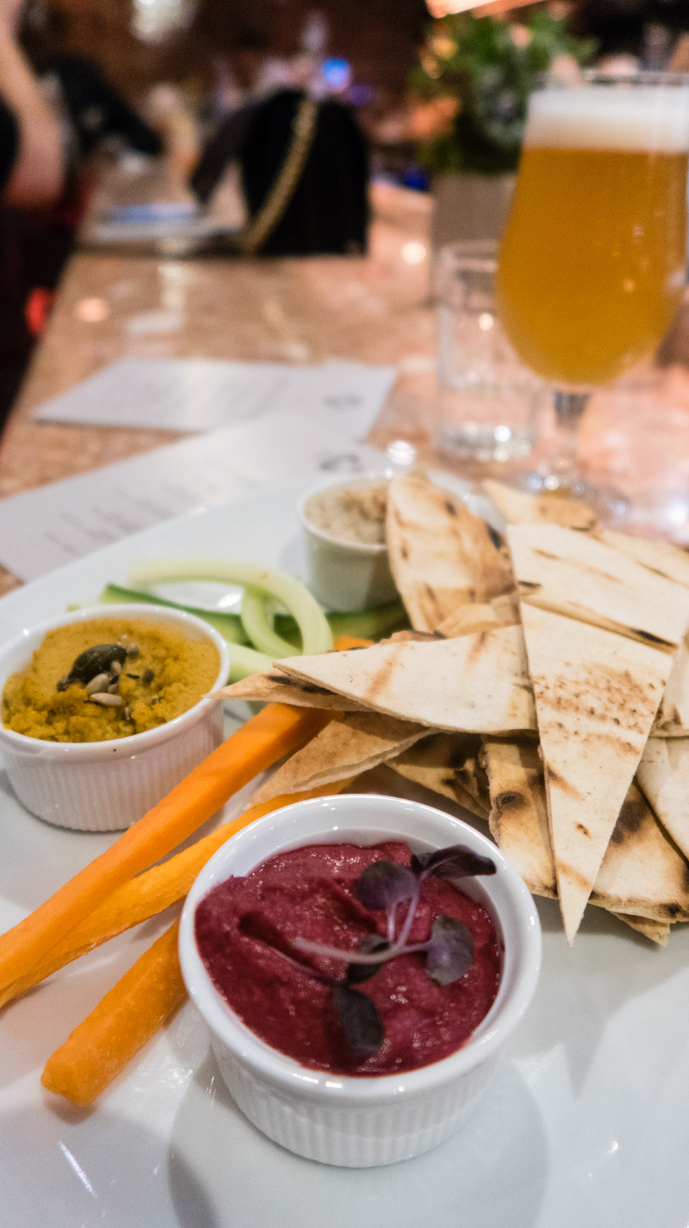 Carrot and cumin spiced hummus, artichoke and white bean dip, beetroot Baba Ghanoush, flat bread and veg sticks (ve)